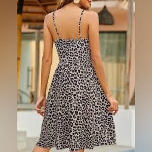 Yathon Elegant Animal Print Midi Dress